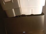 two coolers stacked on top of each other on a table