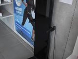 a television that is sitting on a stand in a room