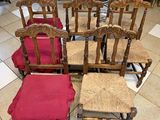 many chairs that are lined up on the floor