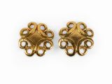 a pair of gold plated brass earrings with an intricate design