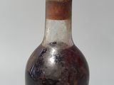 a bottle of wine that is sitting on a table