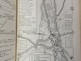 an open book with a map of a city on it
