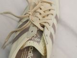 a close up of a pair of shoes with laces on them