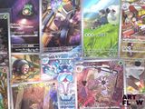 a lot of cards that are on the table
