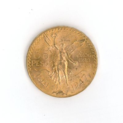 une image d'une pièce d'or sur une surface blanche