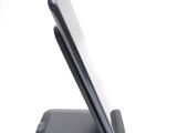 a cell phone that is sitting on top of a stand