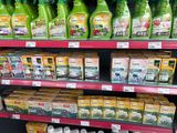 many bottles of cleaning products on the shelves in the store