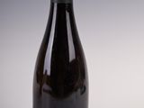 a bottle of wine that is sitting on a table