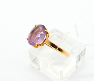 Bague en or jaune 750 °/°° (18k) sertie d'une améthyste tail… - Photo 1