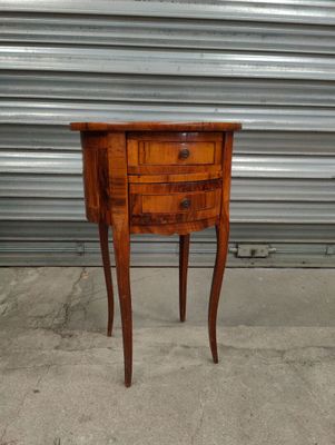 an image of a small wooden table with a drawer on it