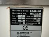 L'étiquette apposée sur la machine indique que celle-ci ne fonctionne pas.