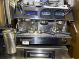 a coffee machine that is sitting on top of a counter