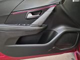 a close up of a car door with a speaker in it