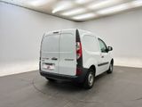a picture of a white van parked in a room