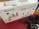 a box with a video light kit sitting on a table