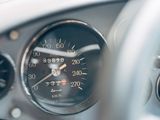 a close up view of a speedometer in a car