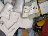 a suitcase full of clothes and other items that are packed together
