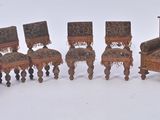 a group of chairs and a chair in a room
