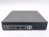 a close up of a dell desktop computer on a white surface