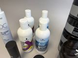 many different types of hair products on the counter