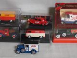 a lot of toy cars and trucks in a display case