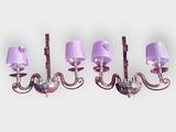 three purple glass chandeliers with shades on each of them