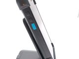a cell phone that is sitting on top of a stand