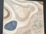 a picture of a rug that is on a table
