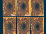four square coasters with a picture of a black hole in the middle