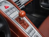 a close up of a car ' s interior with a gear lever