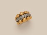 a gold and diamond ring
