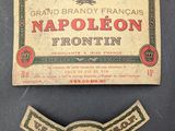 a close up of a label and a badge on a table