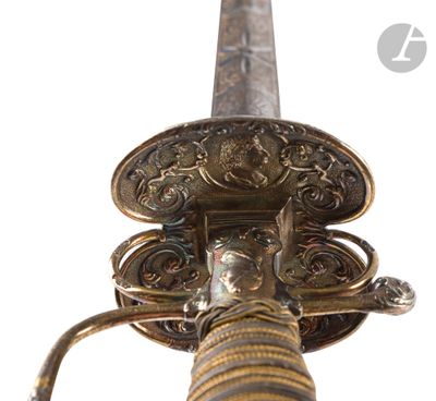 a close up view of a sword with a metal handle