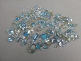 some very pretty blue and white stones on a table