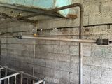 pipes that are connected to the wall of a building