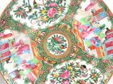 an image of a decorative plate with flowers and birds on it