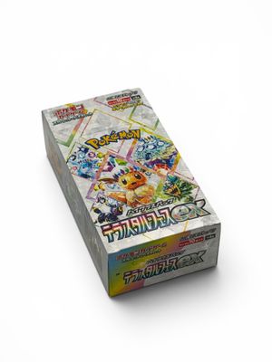 a box of pokemon trading cards on a white surface