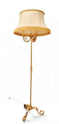 une image représentant une lampe posée sur un pied et munie d'un abat-jour