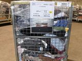 a cart with a lot of items in it in a warehouse