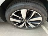 a close up of a tire on a car ' s rim