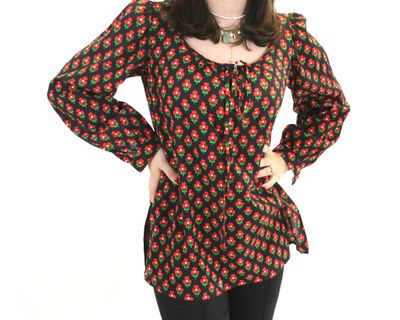 a woman standing with her hands on her hips