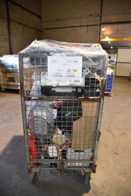 a cart with a lot of items in it in a warehouse