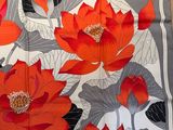 an image of a square scarf with red flowers on it