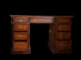 a wooden desk with drawers and drawers on top of it