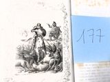 un livre sur lequel figure le dessin d'un homme à cheval