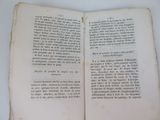 an open book that is sitting on a table