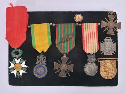 an image of a display of medals and medals on a black board