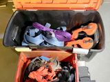 an orange box with a pair of shoes in it