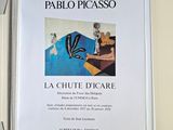 a book with a picture of a woman sitting on a chair