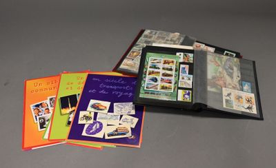 a lot of postcards in a folder on the table